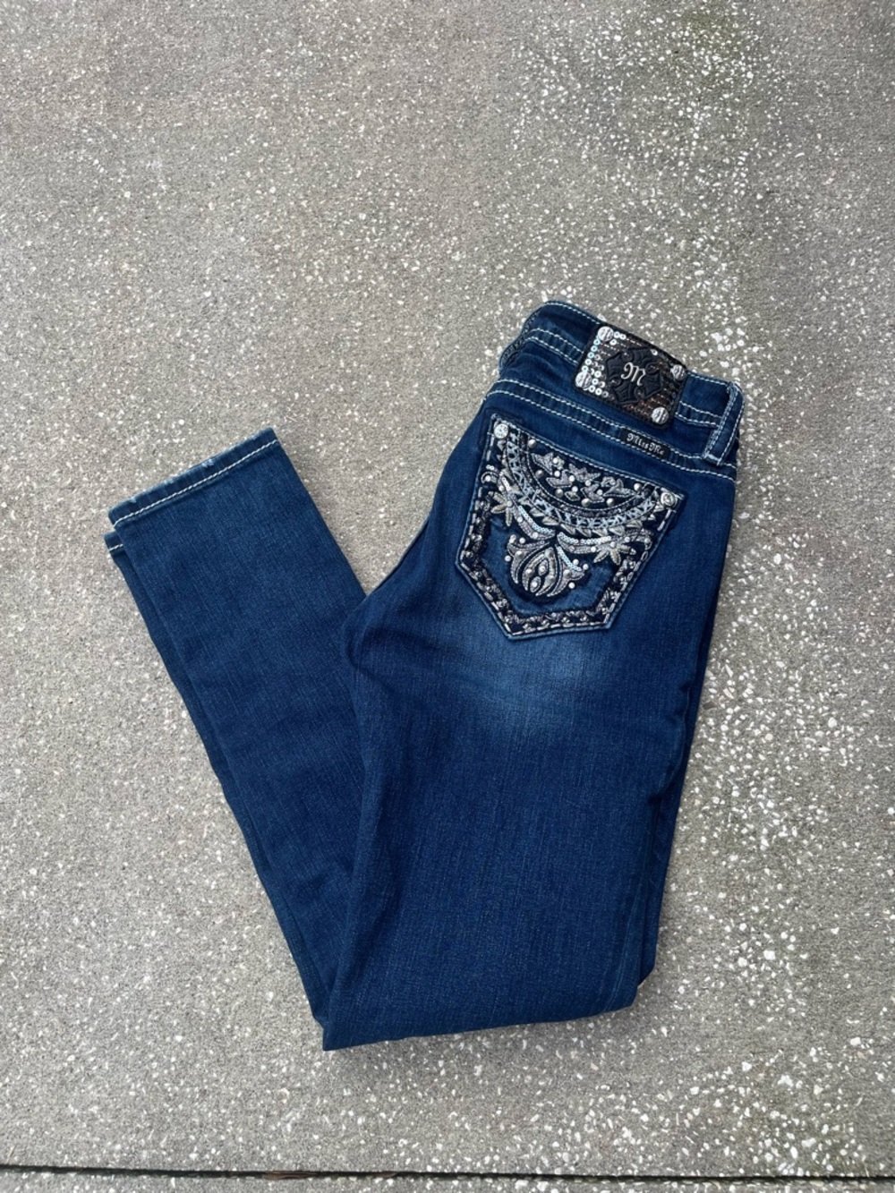 Miss Me skinny jeans with silver accents size 28